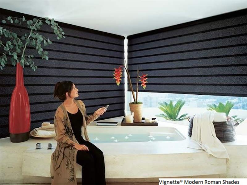 black motorized blinds in bright bathroom scene